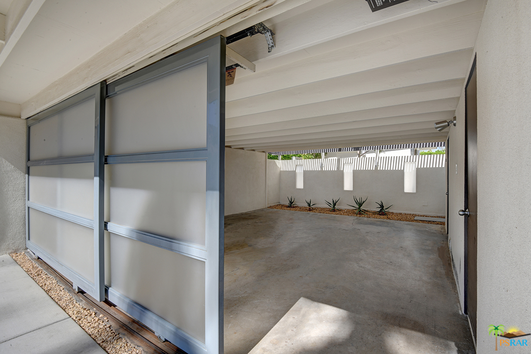 984 East La Jolla Road Palm Springs, CA 92264 - Photo 41 of 53 a view of a room with wooden floor