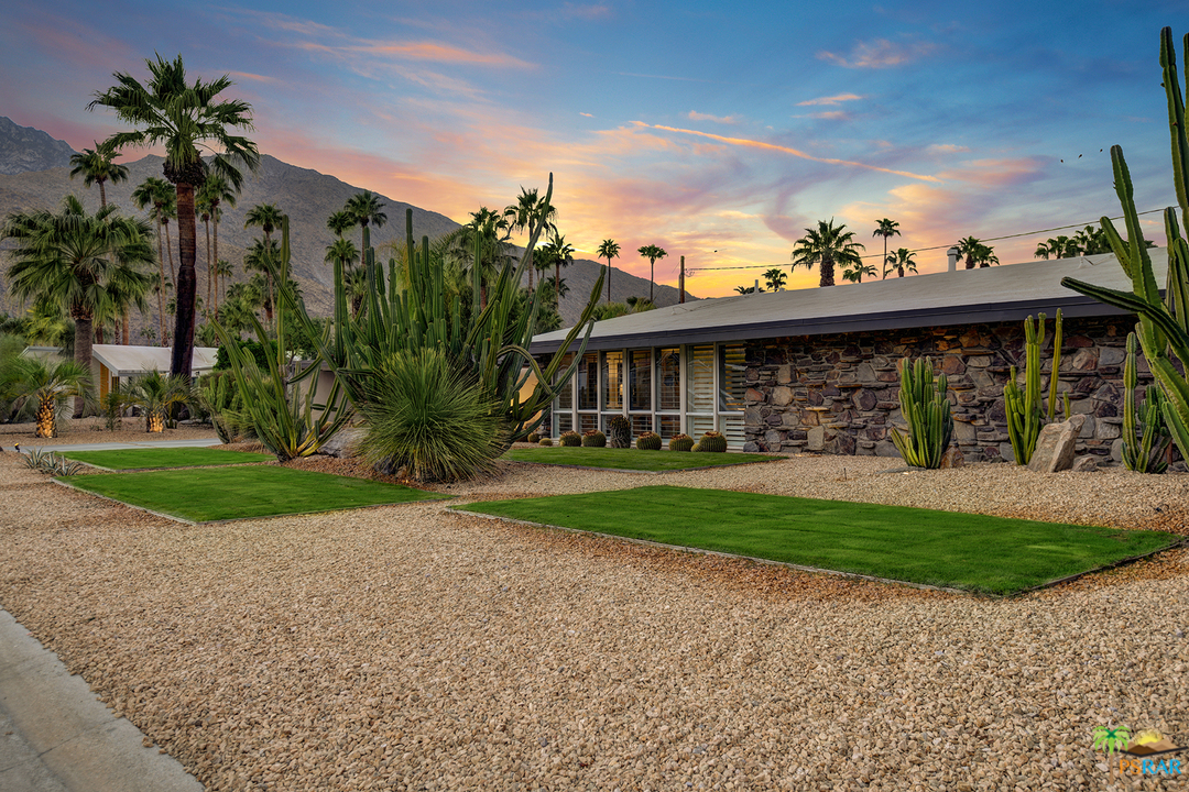 984 East La Jolla Road Palm Springs, CA 92264 - Photo 49 of 53 a view of a house with a yard and potted plants