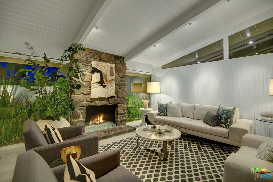 984 East La Jolla Road Palm Springs, CA 92264 - Photo 52 of 53 a living room with furniture and a fireplace