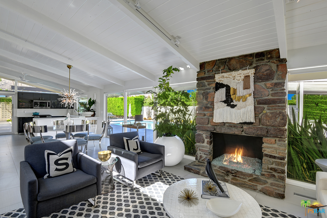 984 East La Jolla Road Palm Springs, CA 92264 - Photo 8 of 53 a living room with furniture and a fireplace