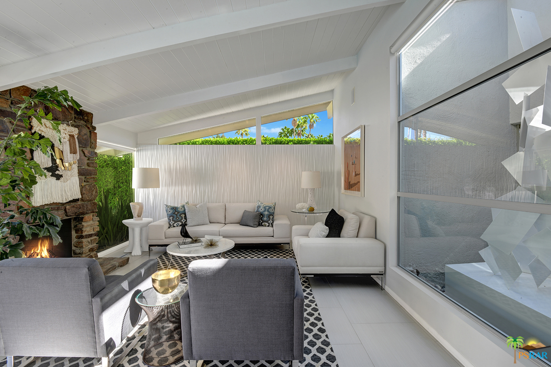 984 East La Jolla Road Palm Springs, CA 92264 - Photo 9 of 53 a living room with furniture and a large window
