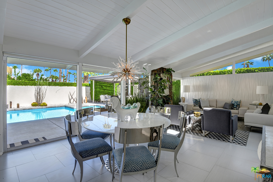 984 East La Jolla Road Palm Springs, CA 92264 - Photo 10 of 53 a view of a dining room with furniture window and outside view