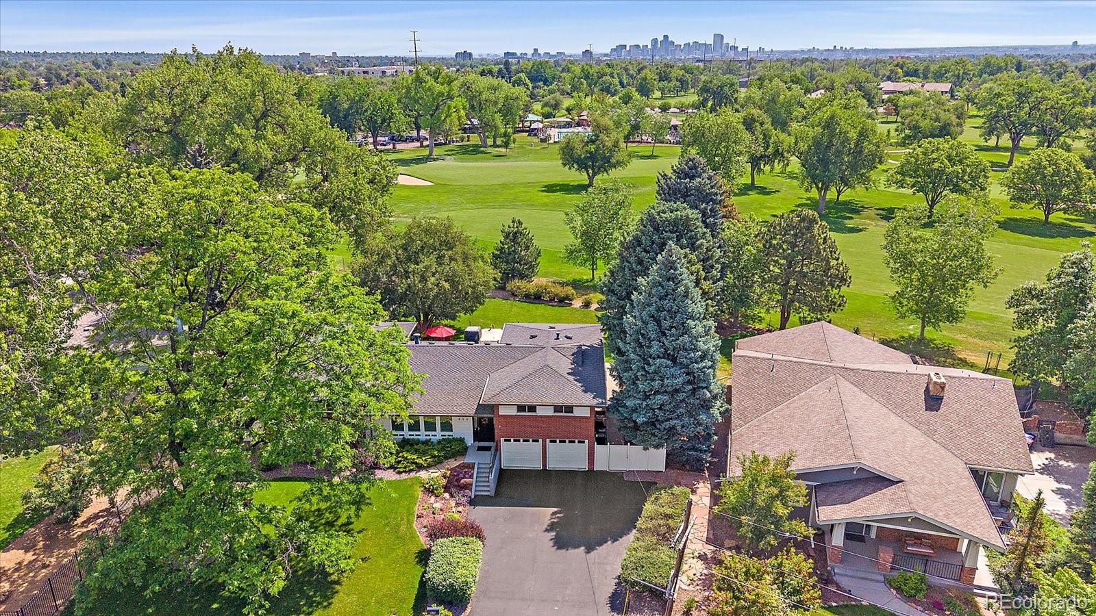 930 Reed Court Lakewood, CO 80214 - Photo 2 of 41 an aerial view of a house with a yard