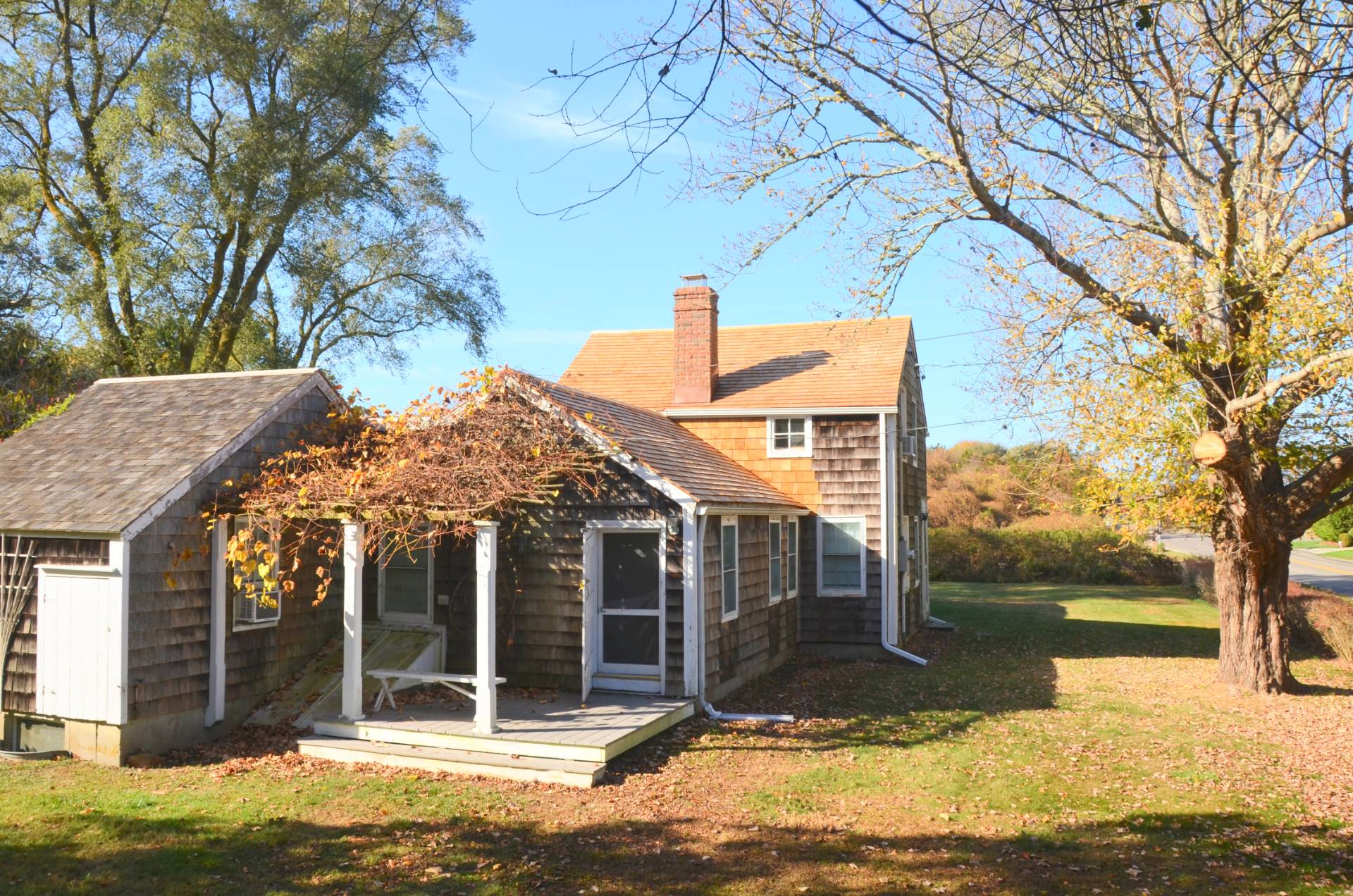 328 Town Line Road Sagaponack, NY 11962 - Photo 2 of 25 a view of a house with snow on the tree