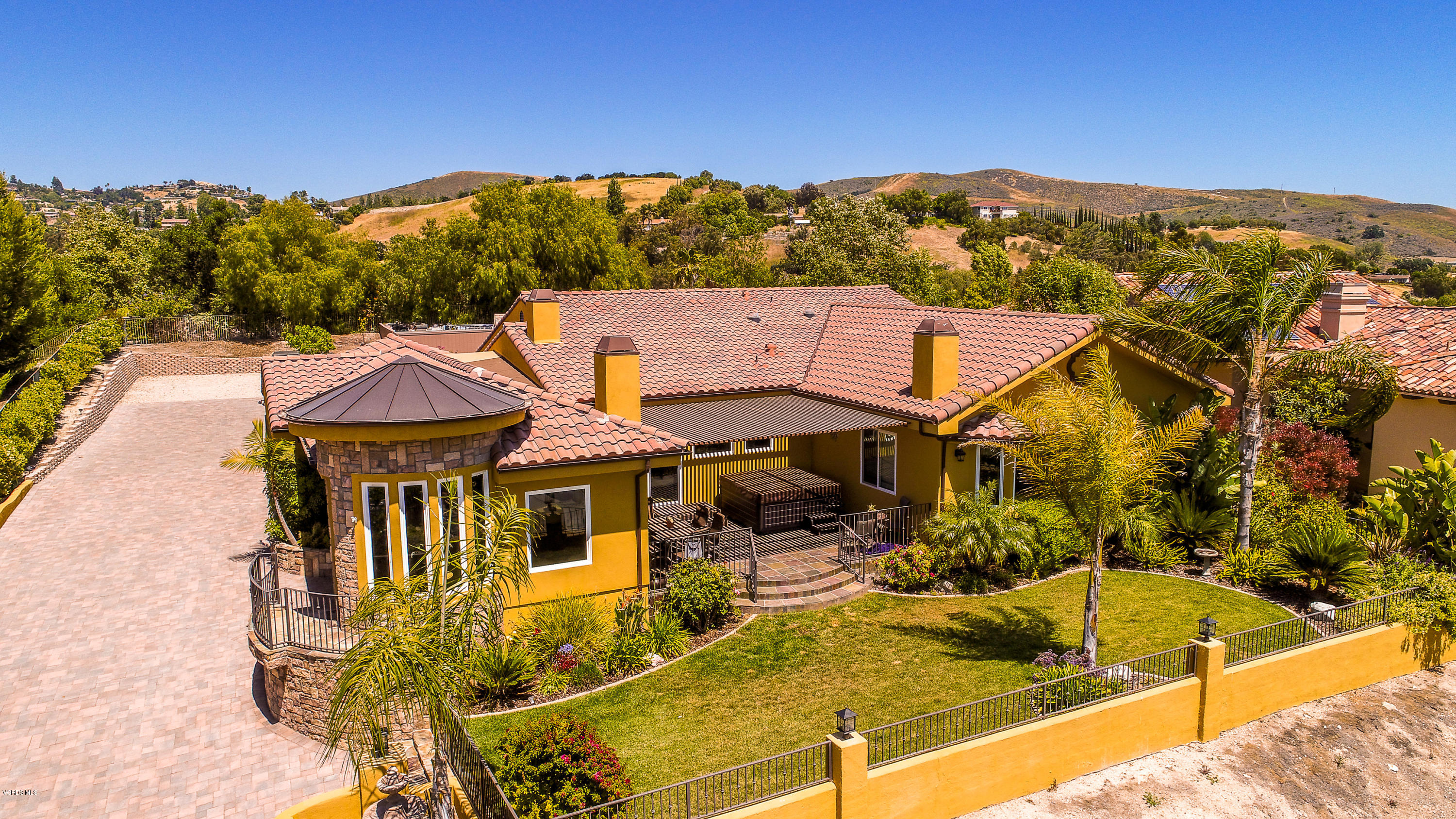 959 Rancho Road Thousand Oaks, CA 91362 - Photo 2 of 57 a view of a house with pool and mountain view
