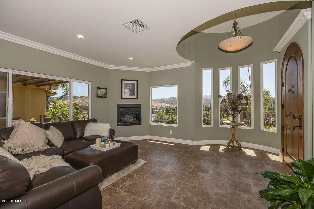 959 Rancho Road Thousand Oaks, CA 91362 - Photo 11 of 57 a living room with furniture and a large window