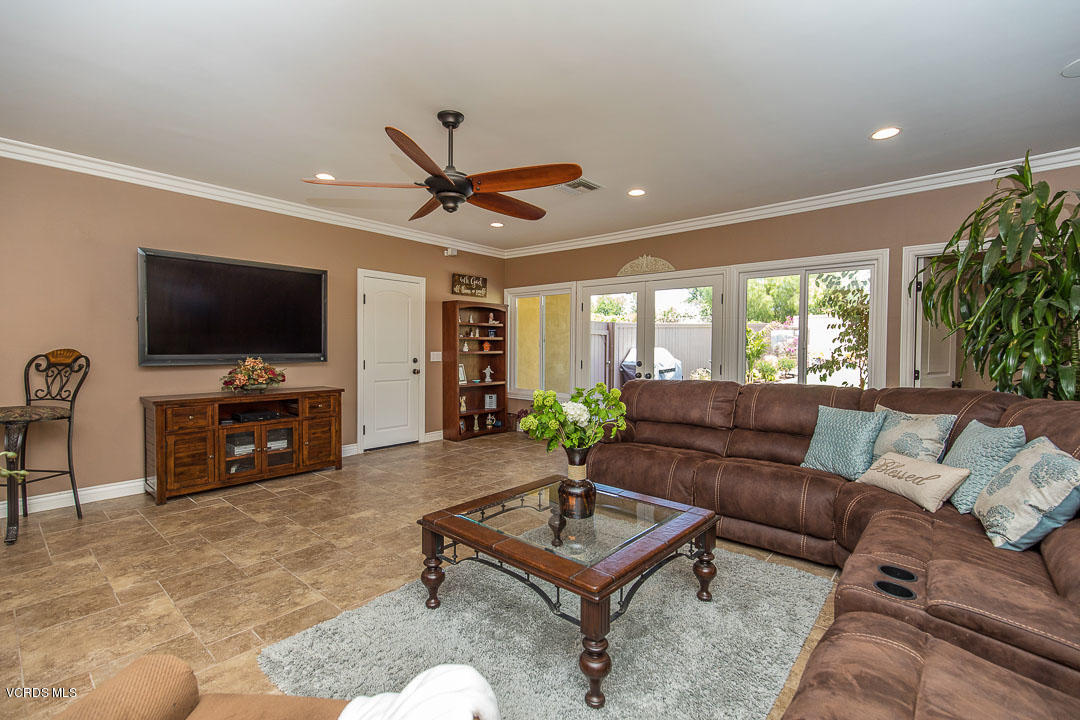 959 Rancho Road Thousand Oaks, CA 91362 - Photo 18 of 57 a living room with furniture and a flat screen tv