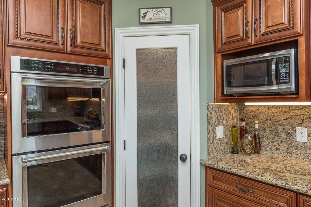 959 Rancho Road Thousand Oaks, CA 91362 - Photo 25 of 57 a kitchen with granite countertop stainless steel appliances granite countertop cabinets and a stove