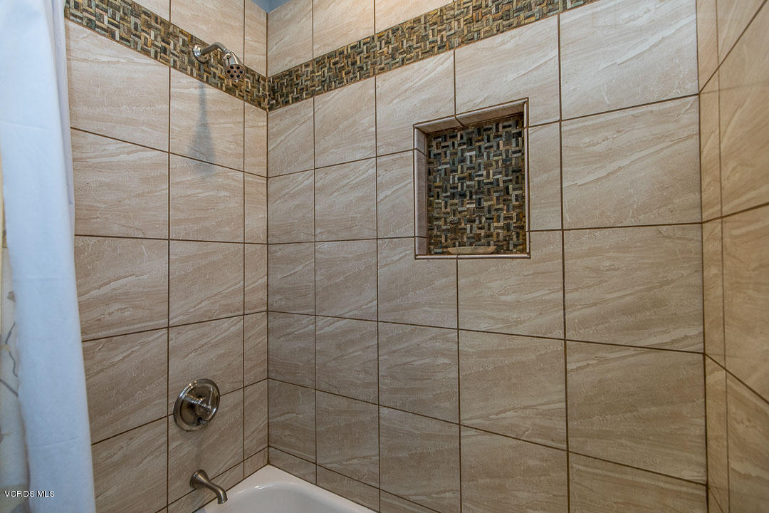 959 Rancho Road Thousand Oaks, CA 91362 - Photo 34 of 57 a bathroom with a shower