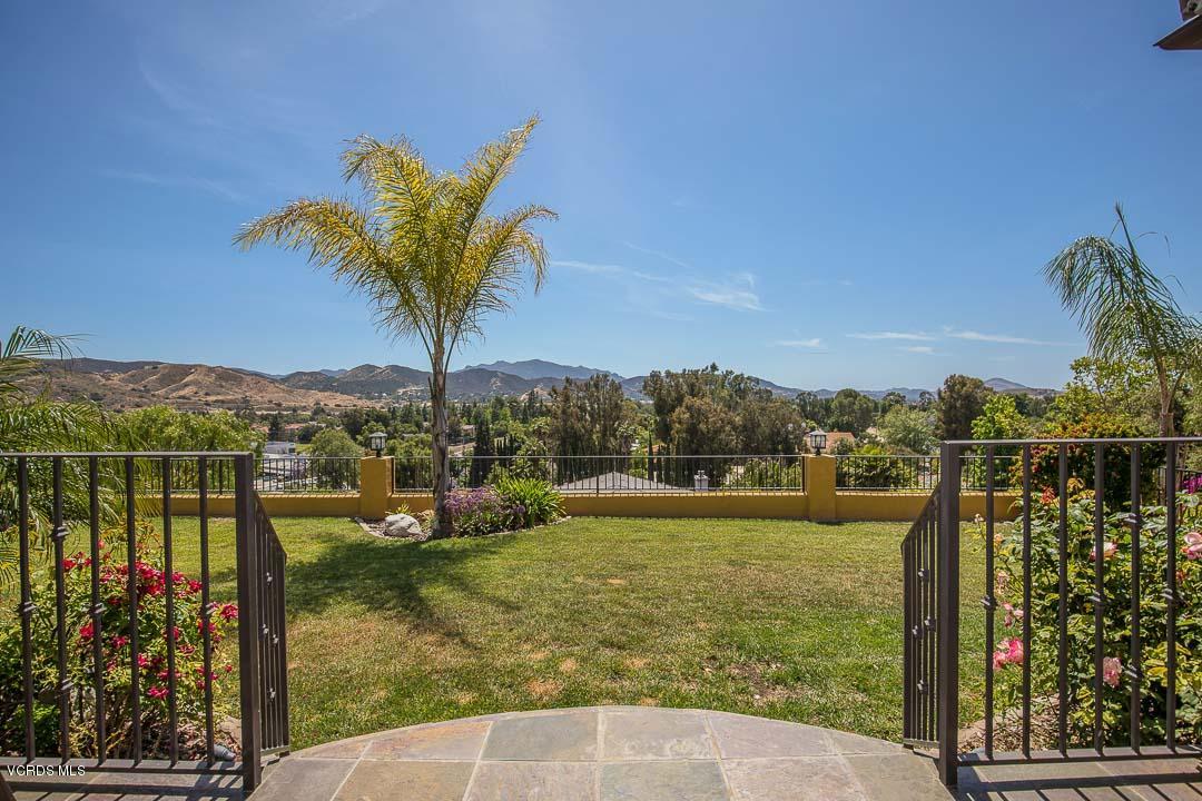 959 Rancho Road Thousand Oaks, CA 91362 - Photo 38 of 57 a view of a lake with a mountain in the background