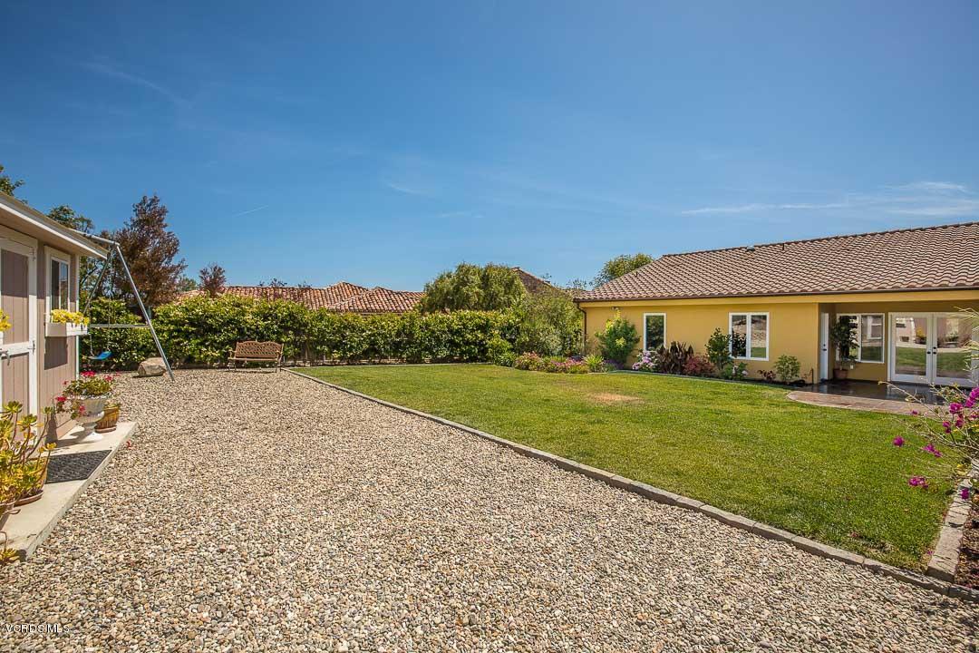 959 Rancho Road Thousand Oaks, CA 91362 - Photo 48 of 57 a view of a house with a yard