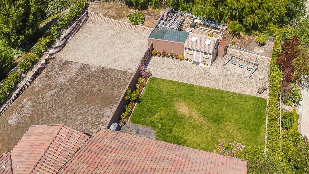959 Rancho Road Thousand Oaks, CA 91362 - Photo 56 of 57 an aerial view of a house with a yard