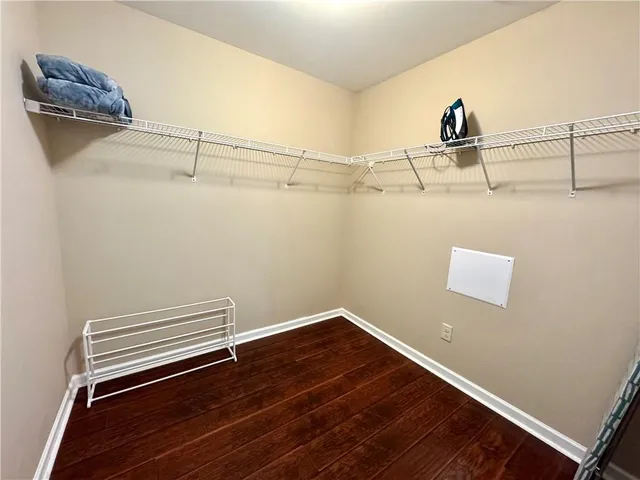 a view of a room with racks on the wall
