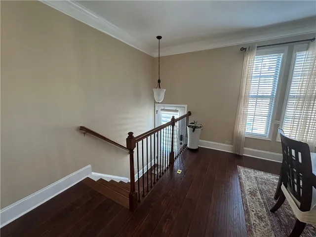 a view of entryway with wooden floor