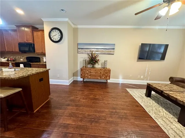 a very nice looking kitchen with a large window