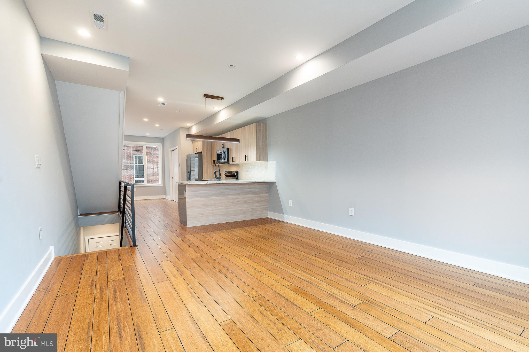 2821 Livingston Street, Unit 2 Philadelphia, PA 19134 - Photo 3 of 24 a view of empty room with wooden floor
