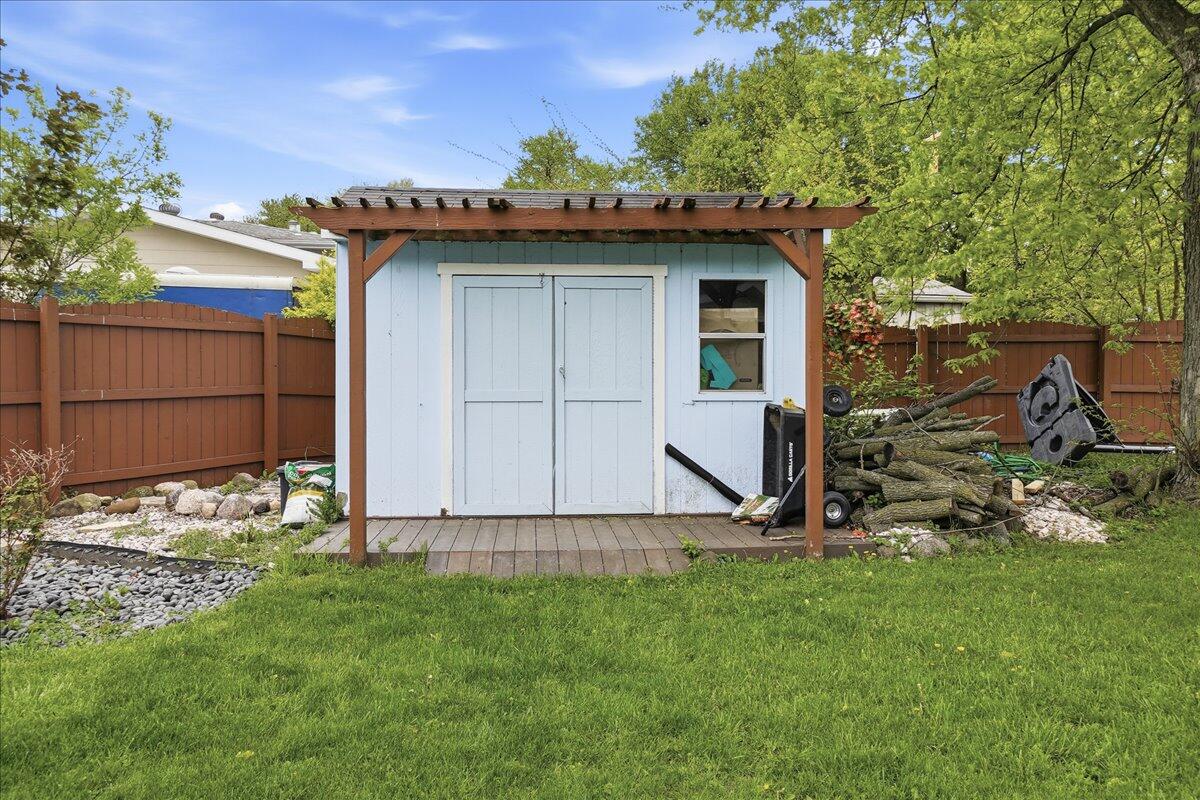 741 Pettibone Street Crown Point, IN 46307 - Photo 29 of 34 a view of a tiny house with a yard and sitting area
