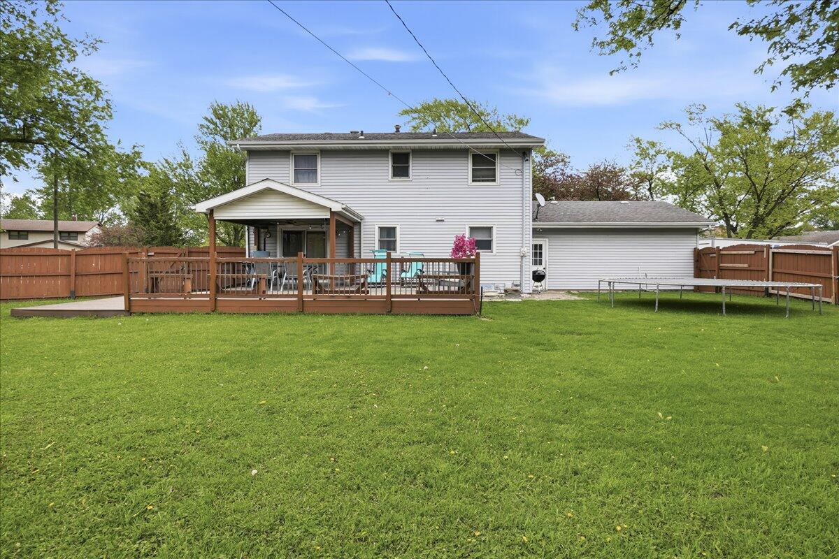 741 Pettibone Street Crown Point, IN 46307 - Photo 30 of 34 a view of a house with a yard and sitting area