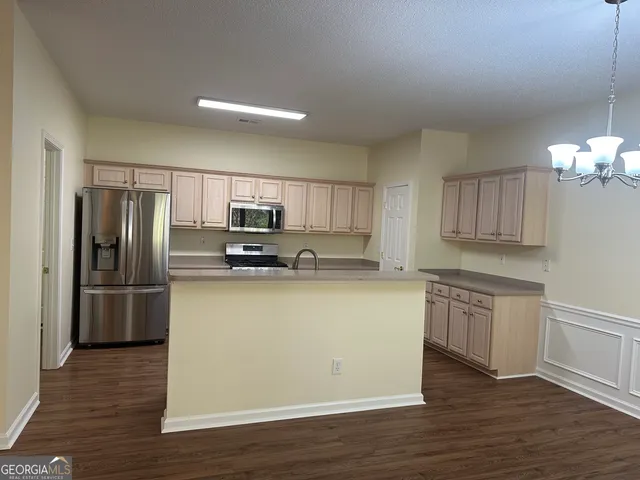 a bathroom with a sink and a shower