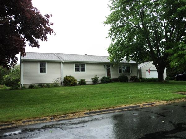 98 Long Road Fairhaven, MA 02719 - Photo 1 of 9 a front view of a house with a garden