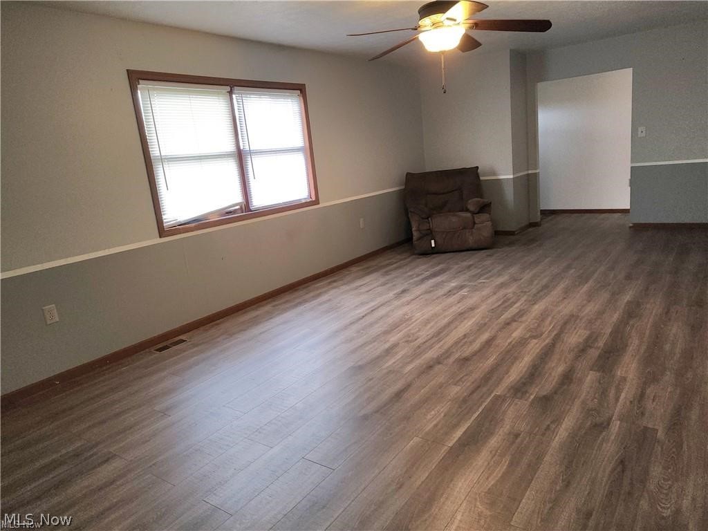 10345 Marne Road Frazeysburg, OH 43822 - Photo 25 of 50 Spare room featuring wood-type flooring and ceiling fan