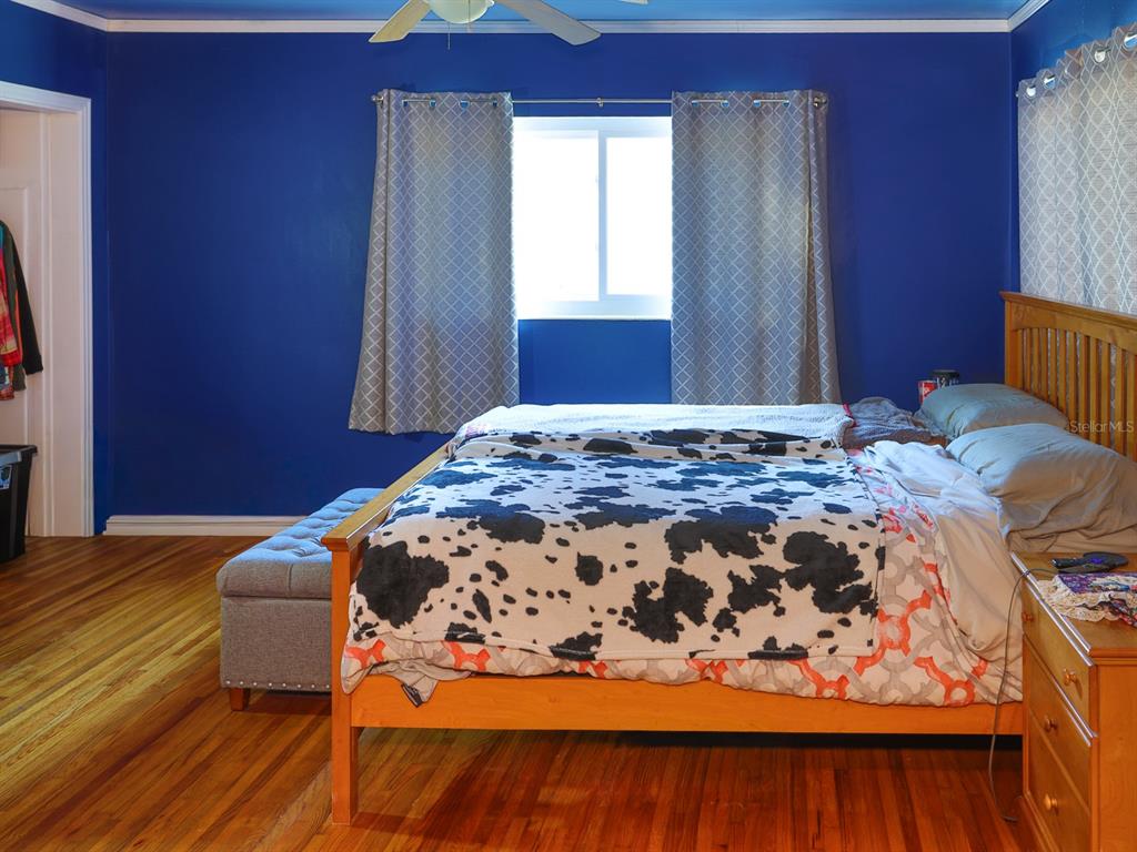 2140 East Main Street Bartow, FL 33830 - Photo 13 of 37 a bed sitting in a bedroom next to a window