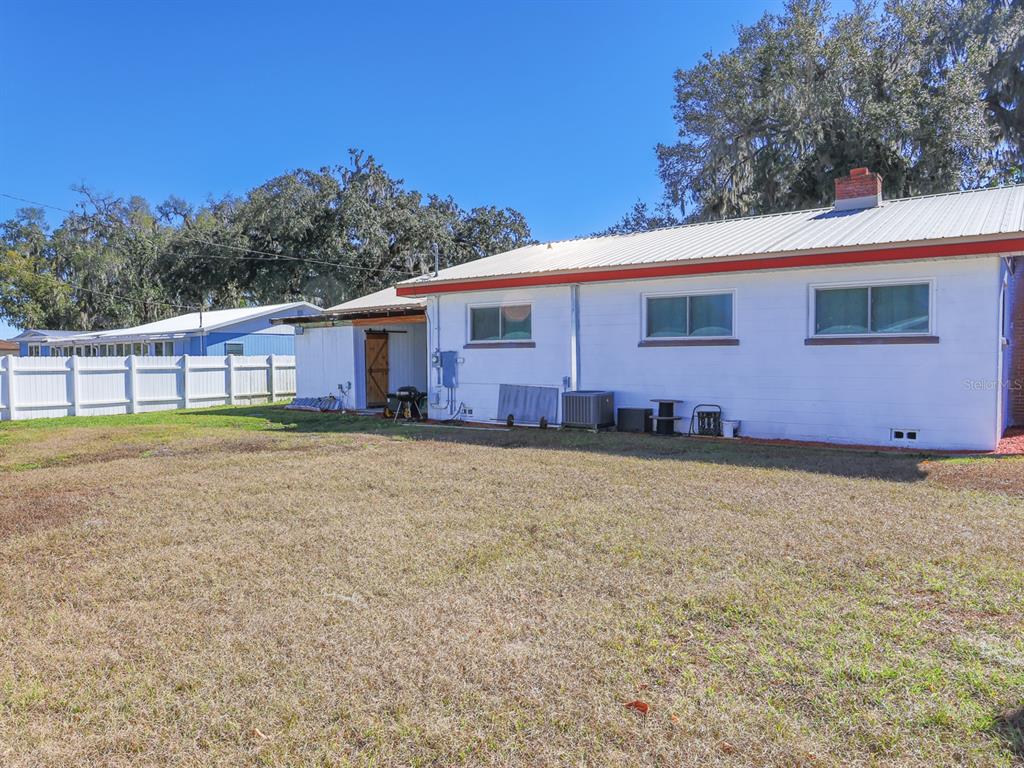 2140 East Main Street Bartow, FL 33830 - Photo 2 of 37 a view of a house with a backyard