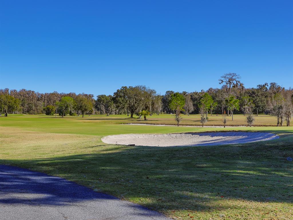 2140 East Main Street Bartow, FL 33830 - Photo 25 of 37 a view of a golf course with a lake