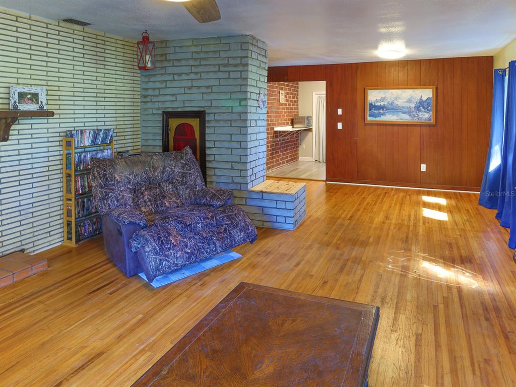 2140 East Main Street Bartow, FL 33830 - Photo 5 of 37 a living room with furniture and a fireplace