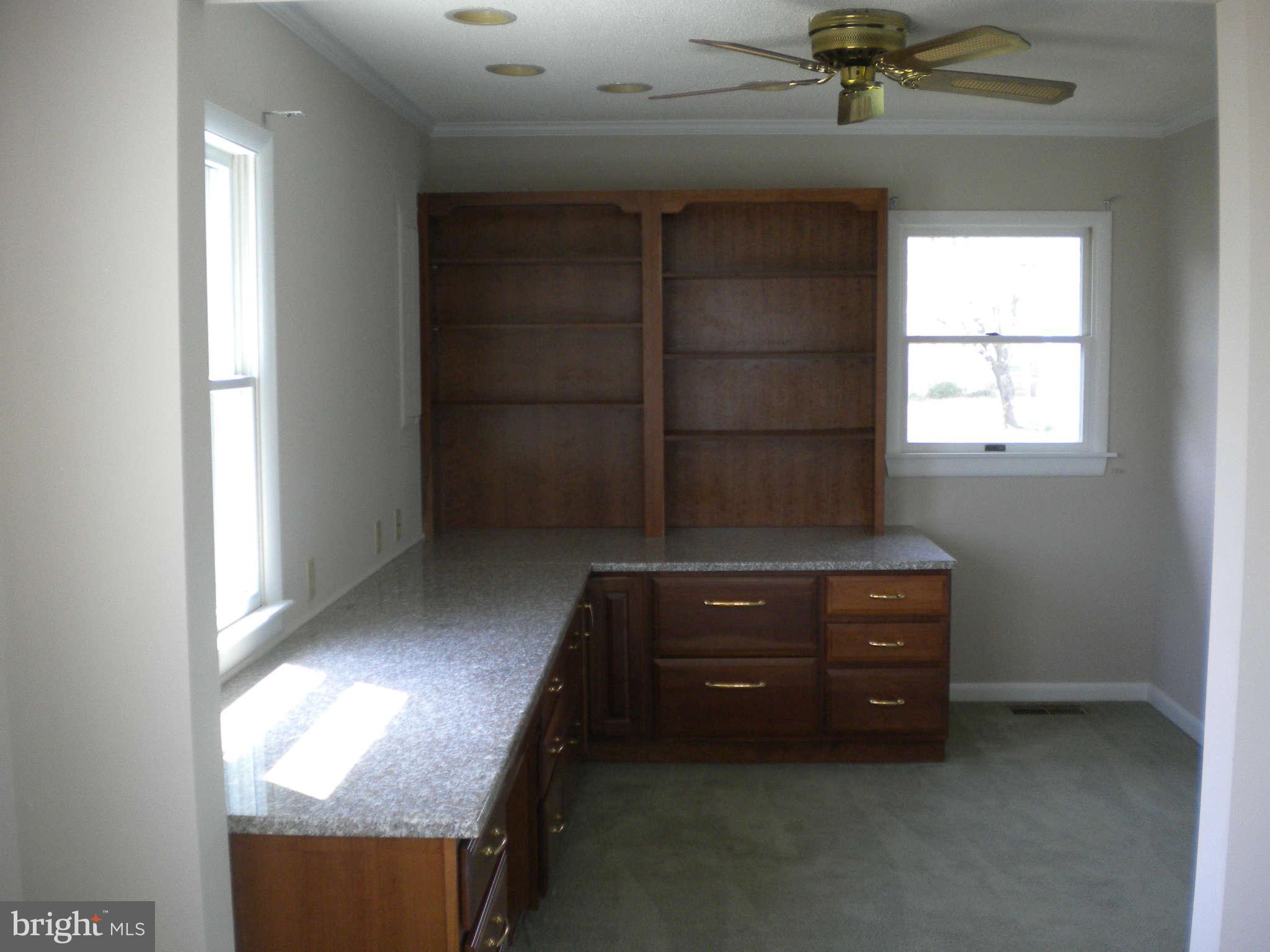 700 Long Point Road Grasonville, MD 21638 - Photo 8 of 20 an empty room with windows