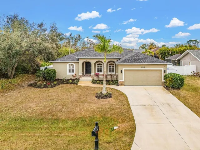 a house view with a swimming pool