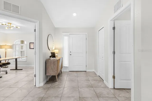 a view of a hallway with entryway