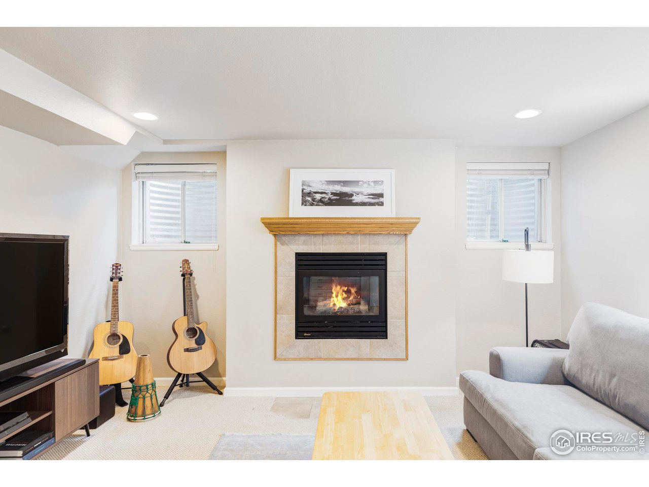 6095 Old Brompton Road Boulder, CO 80301 - Photo 25 of 34 a living room with furniture and a fireplace