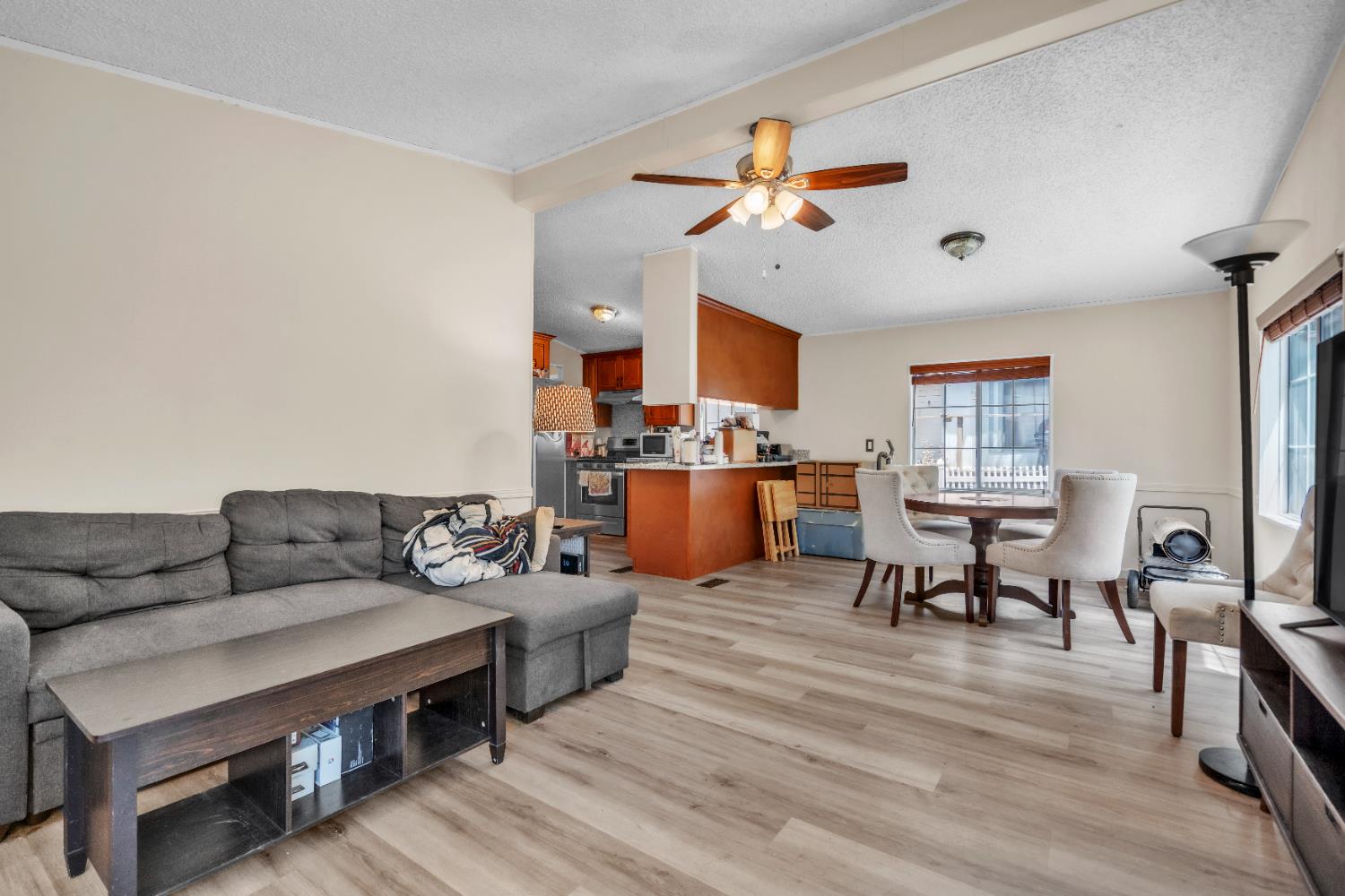 8074 Perry Creek Road, Unit 31 Somerset, CA 95684 - Photo 12 of 20 a living room with furniture and kitchen view