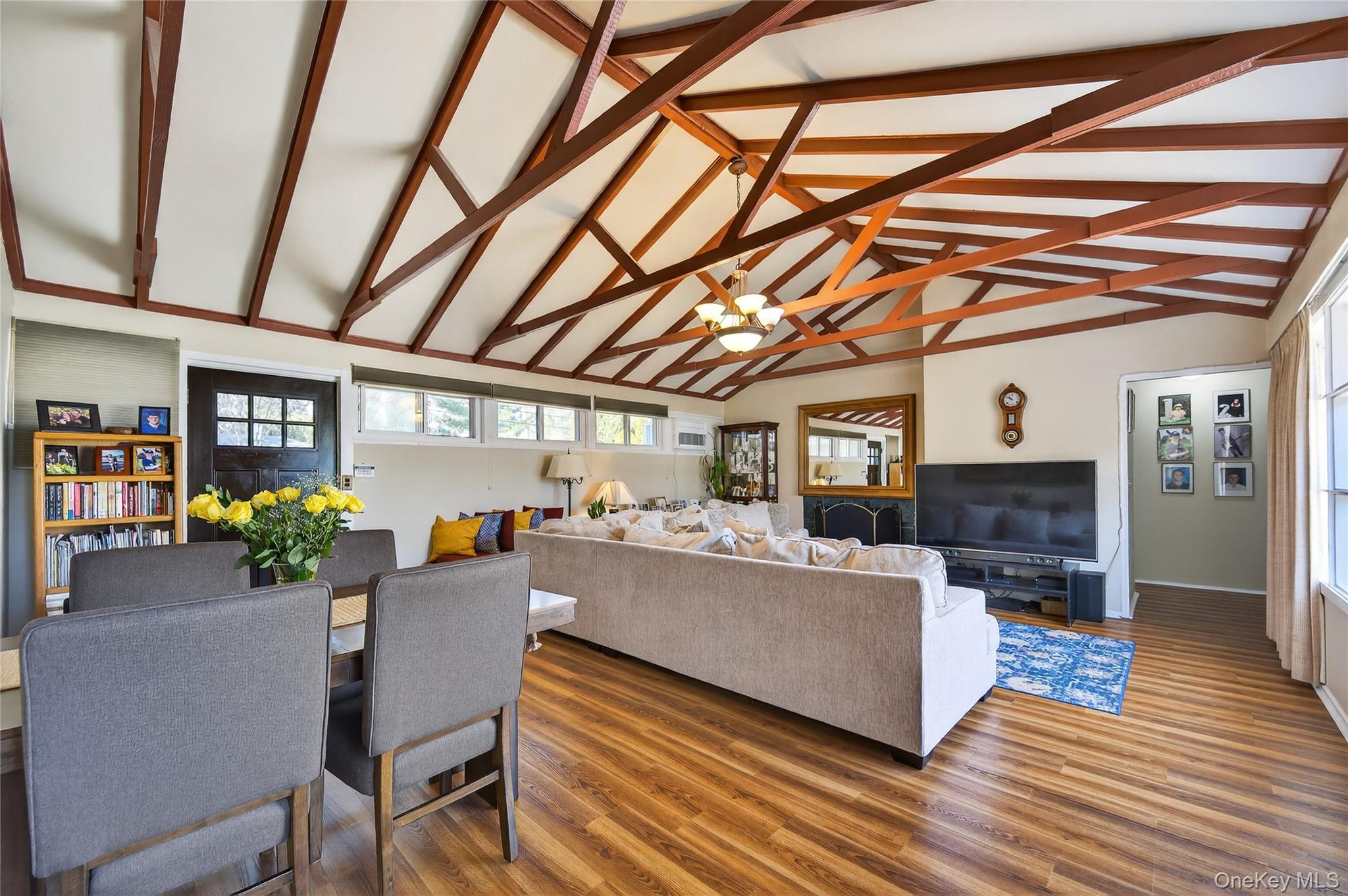 6 Wellington Road Greenvale, NY 11548 - Photo 4 of 21 Living Room/Dining Room Highlighted by Cathedral Ceiling