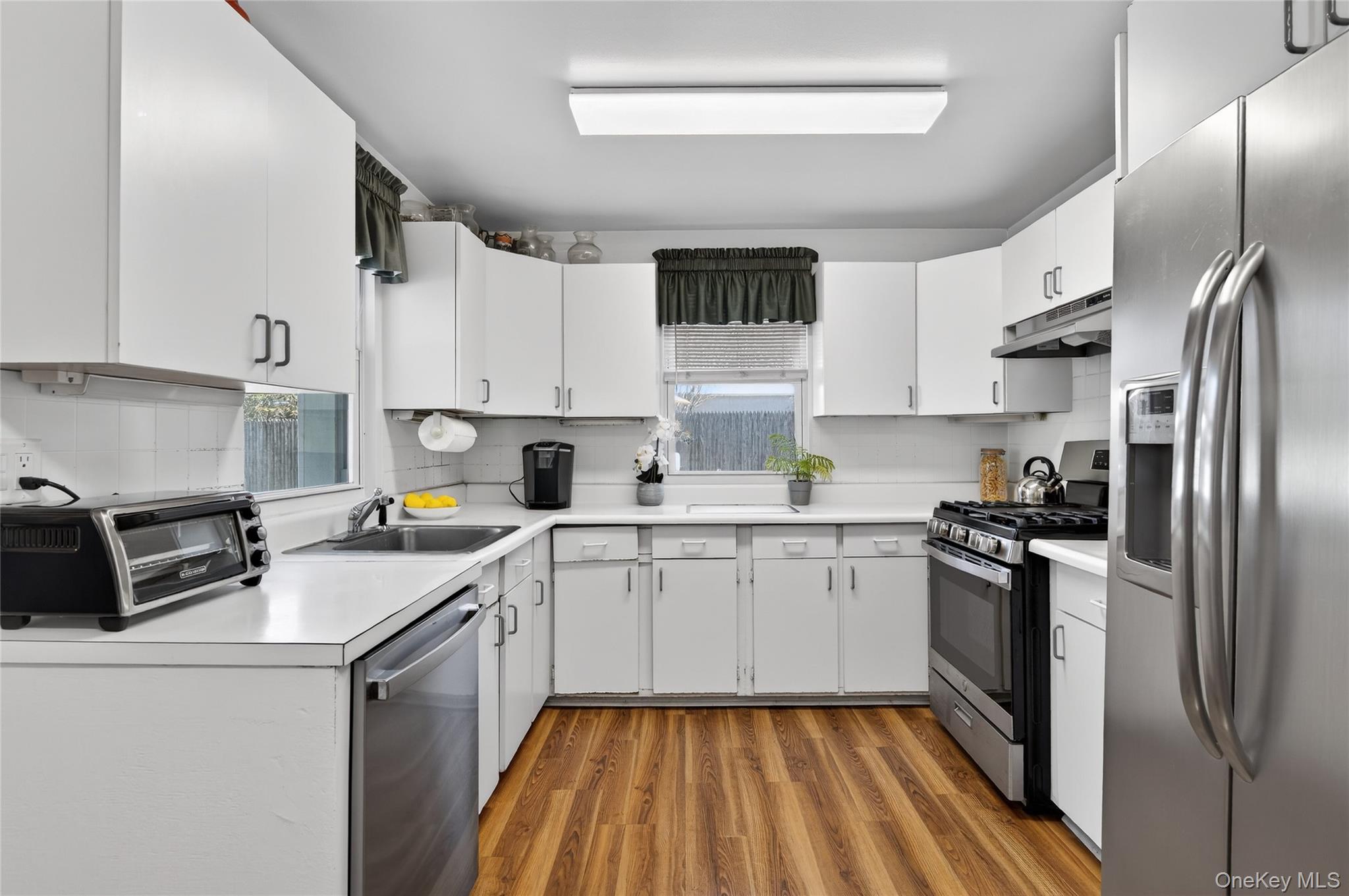6 Wellington Road Greenvale, NY 11548 - Photo 9 of 21 Kitchen boasts brand new stainless steel appliances