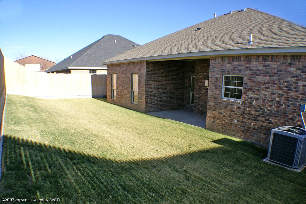 5304 Pleasant Court Amarillo, TX 79110 - Photo 13 of 13 a view of a house with backyard and garden