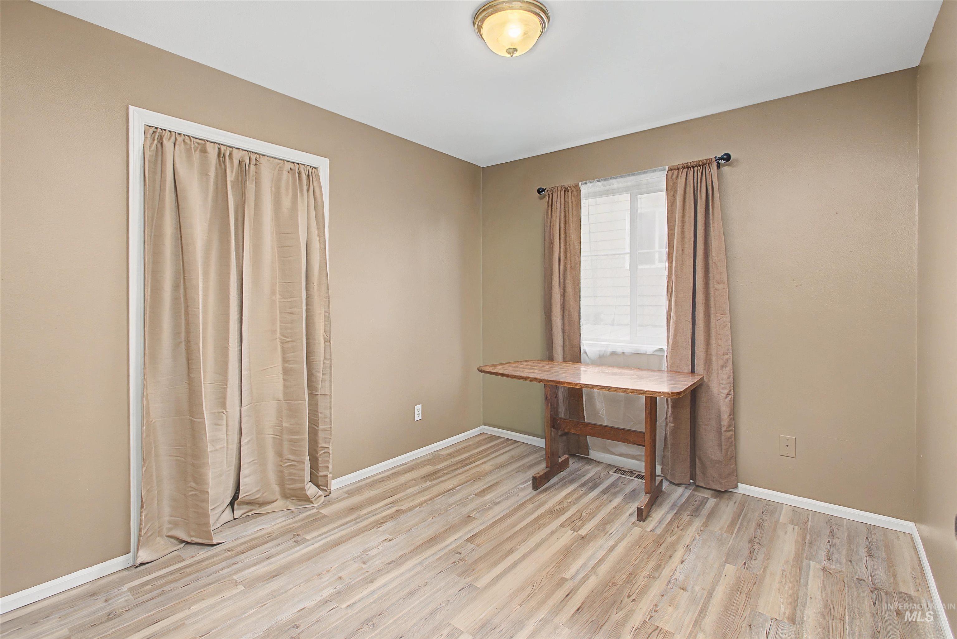 919 9th Street Clarkston, WA 99403 - Photo 19 of 34 Unfurnished office featuring light wood-type flooring and baseboards