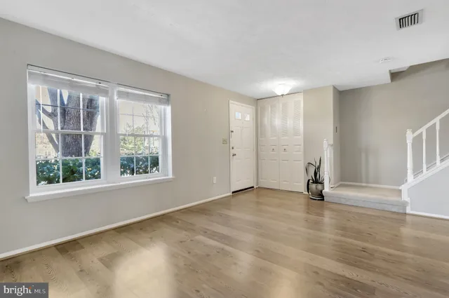 an empty room with windows