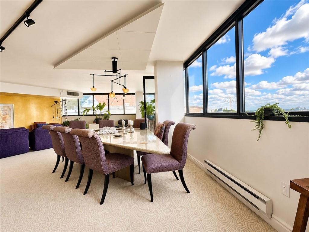 1 Trimont Lane, Unit 490E Pittsburgh, PA 15211 - Photo 7 of 31 The Dining Room is 15'x12' with two walls of windows