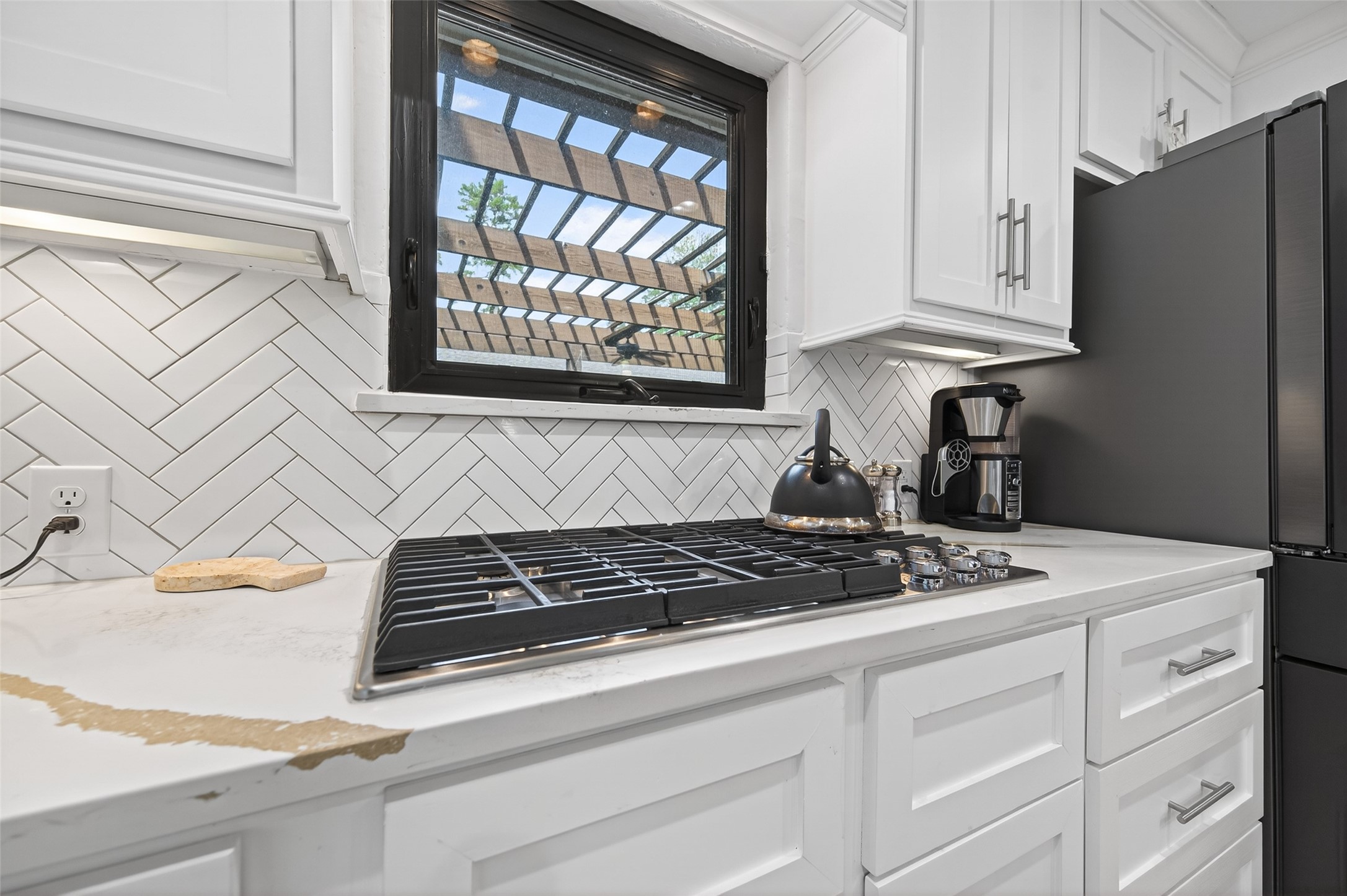 6226 Pebble Beach Drive Houston, TX 77069 - Photo 12 of 46 a kitchen with stainless steel appliances granite countertop a stove and a microwave