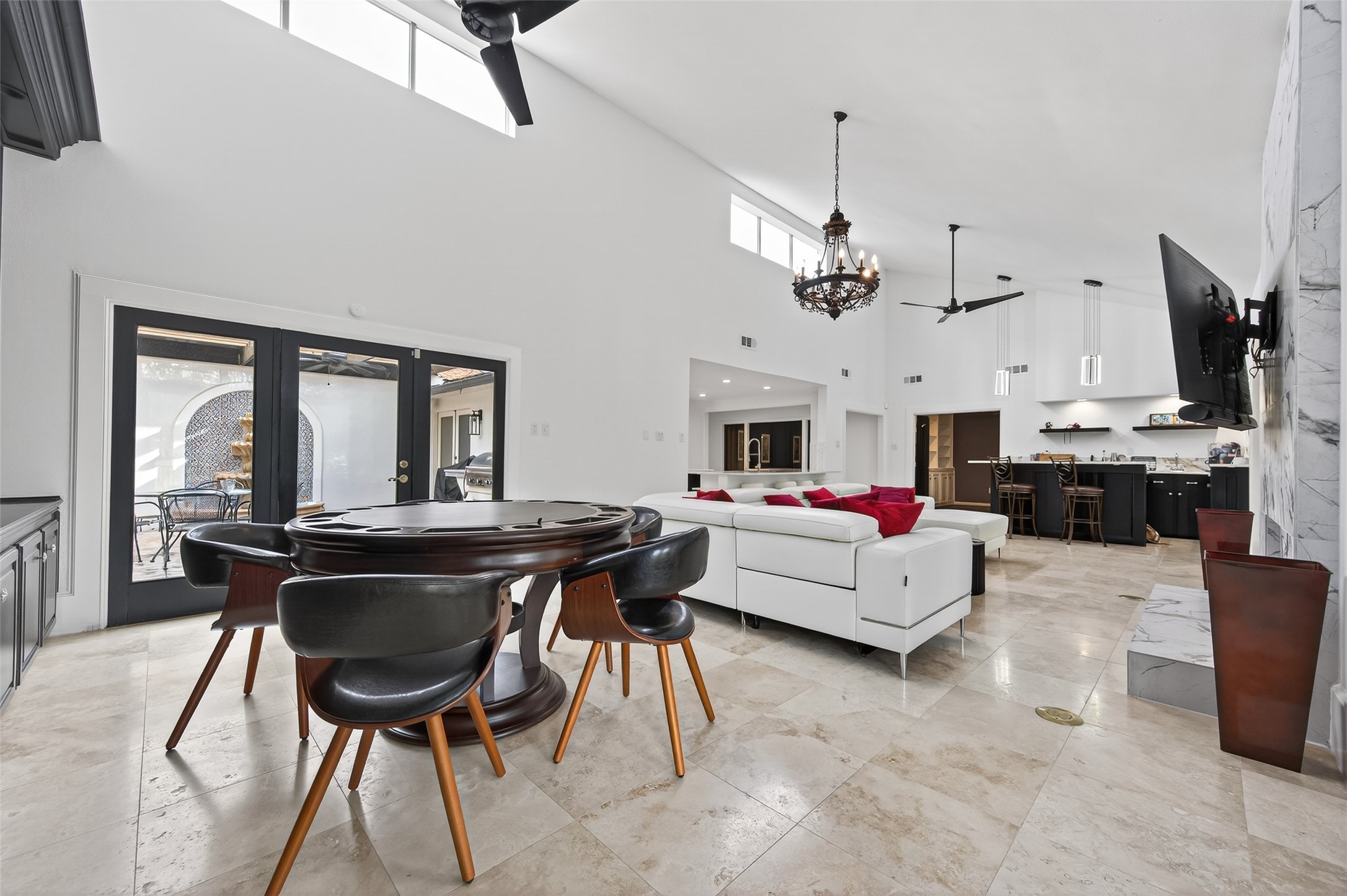 6226 Pebble Beach Drive Houston, TX 77069 - Photo 13 of 46 a living room with furniture and a chandelier