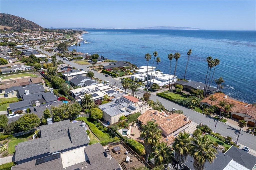 318 Indio Drive Pismo Beach, CA 93449 - Photo 2 of 58 an aerial view of a city with lots of residential buildings ocean and mountain view in back