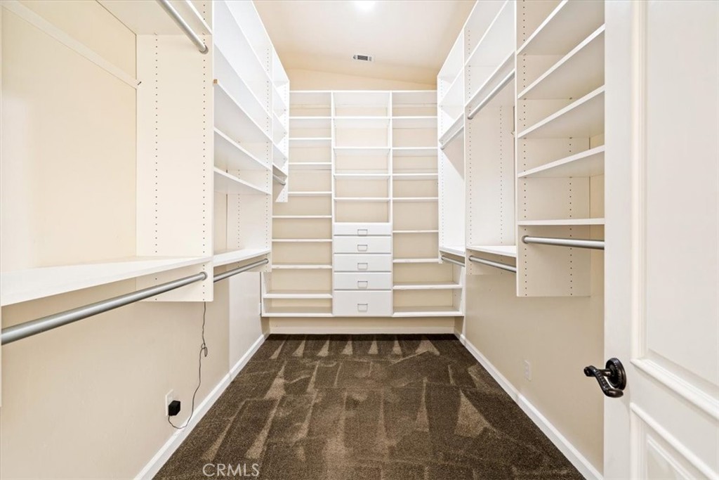 318 Indio Drive Pismo Beach, CA 93449 - Photo 22 of 58 a view of walk in closet with empty racks