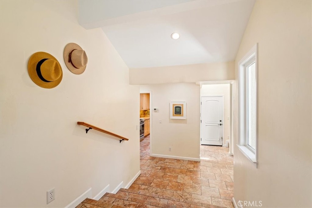 318 Indio Drive Pismo Beach, CA 93449 - Photo 33 of 58 a view of a room with wooden floor and white walls