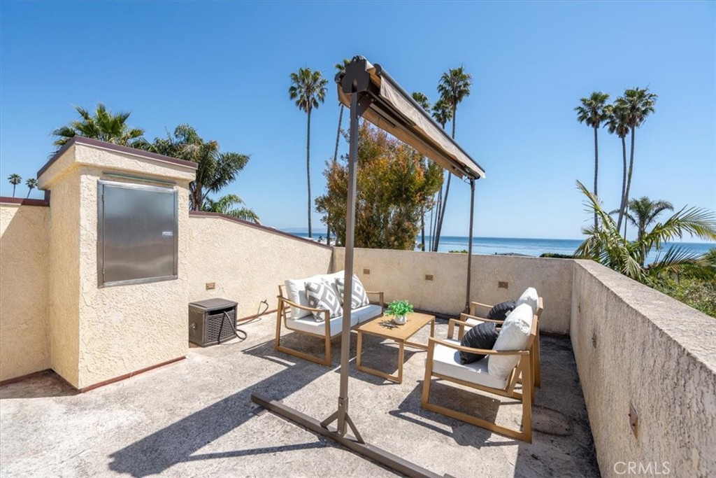 318 Indio Drive Pismo Beach, CA 93449 - Photo 37 of 58 a view of a balcony with furniture