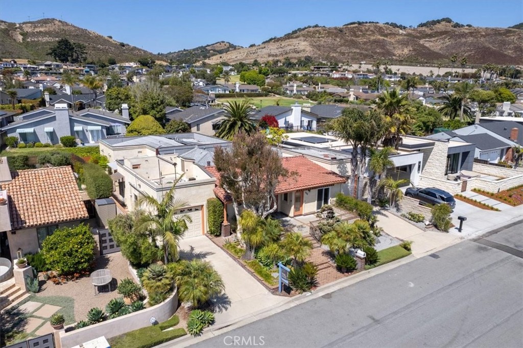 318 Indio Drive Pismo Beach, CA 93449 - Photo 40 of 58 an aerial view of residential houses with street