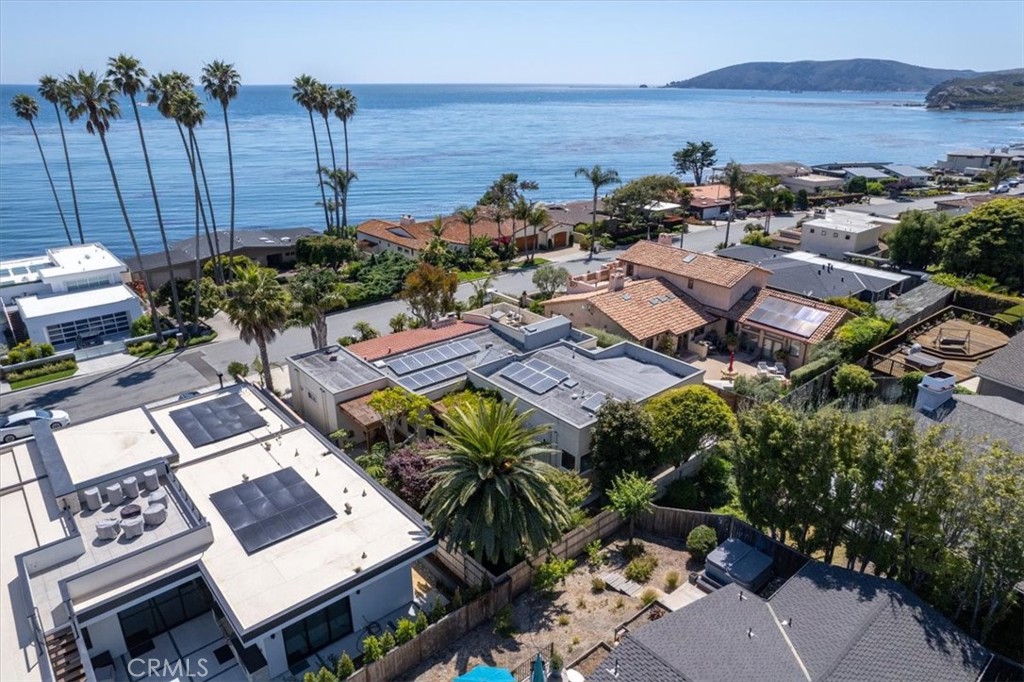 318 Indio Drive Pismo Beach, CA 93449 - Photo 4 of 58 an aerial view of a house with outdoor space and lake view