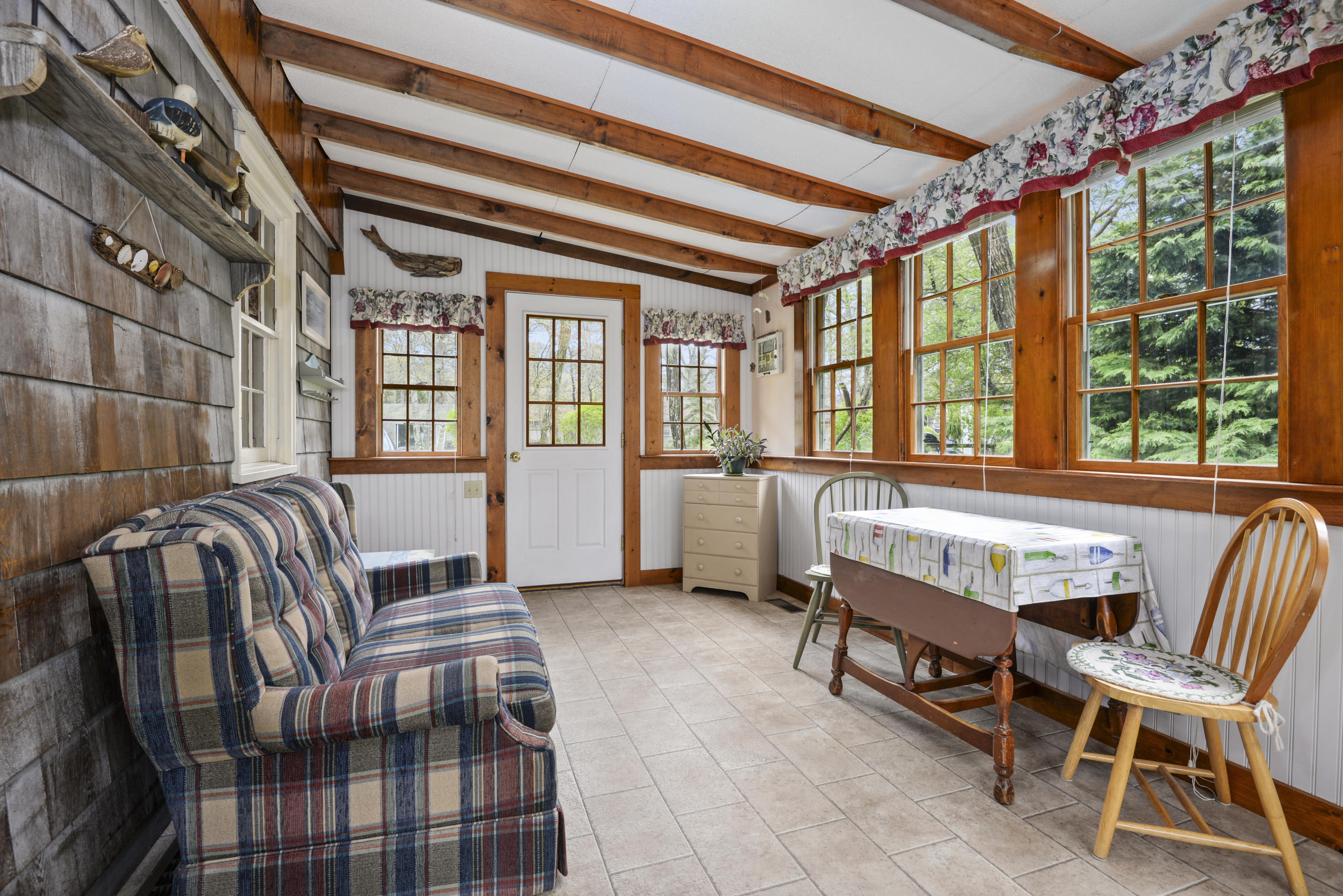 5490 State Highway Eastham, MA 02642 - Photo 12 of 28 a living room with furniture and a window
