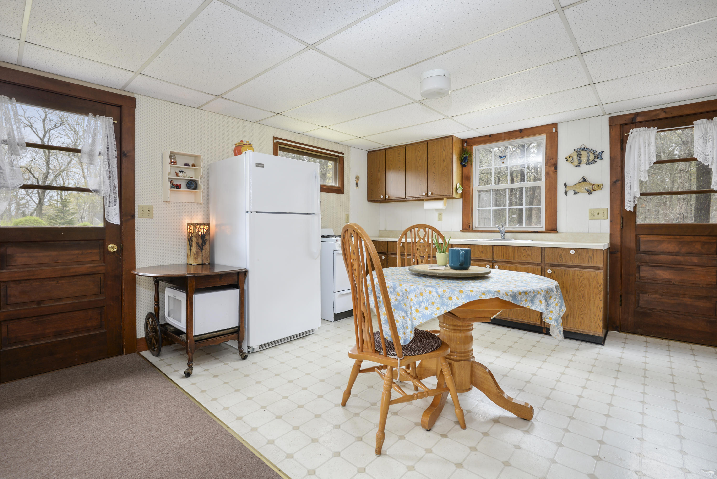 5490 State Highway Eastham, MA 02642 - Photo 13 of 28 a dining room with furniture and window